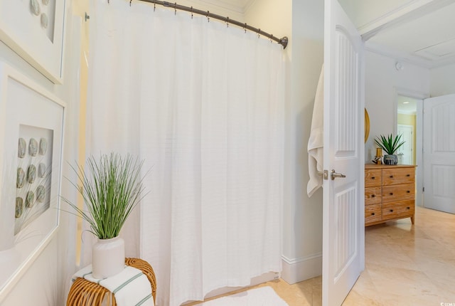 full bath featuring crown molding and curtained shower