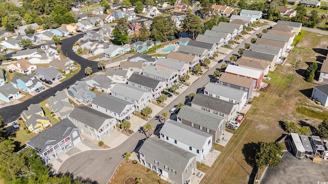 aerial overview of property's location with nearby suburban area