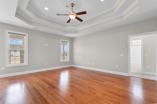 4067 Ridgewood Dr, Conway, SC 29526 - unfurnished room featuring a raised ceiling, ornamental molding, light wood-type flooring, ceiling fan, and baseboards