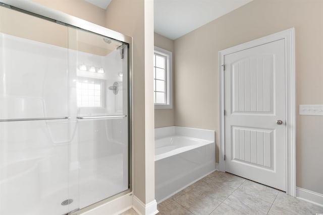 4067 Ridgewood Dr, Conway, SC 29526 - bathroom featuring a shower stall, a bath, and baseboards