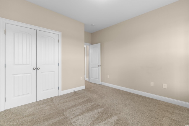 4067 Ridgewood Dr, Conway, SC 29526 - unfurnished bedroom with carpet floors, baseboards, and a closet