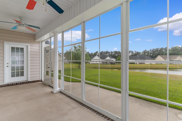 4067 Ridgewood Dr, Conway, SC 29526 - unfurnished sunroom with a ceiling fan and a water view