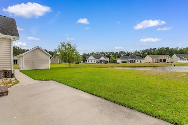 4067 Ridgewood Dr, Conway, SC 29526 - view of grassy yard with a water view and a residential view