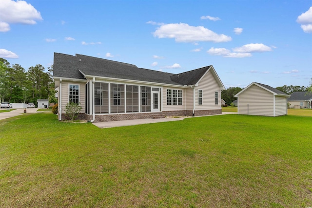 4067 Ridgewood Dr, Conway, SC 29526 - back of property featuring a lawn, a sunroom, and a shingled roof