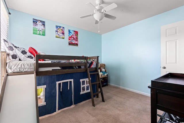 bedroom with carpet floors, ceiling fan, and baseboards