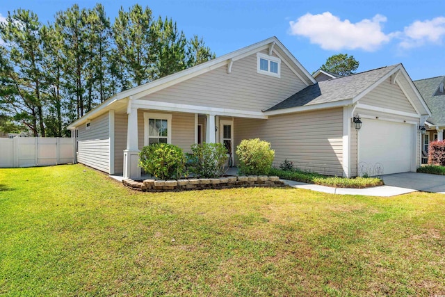view of front of house with a garage, driveway, roof with shingles, and covered porch
