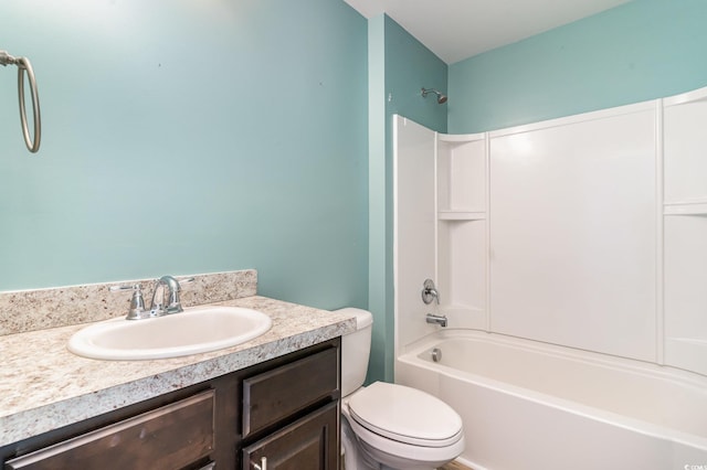 full bath with vanity, toilet, and bathtub / shower combination