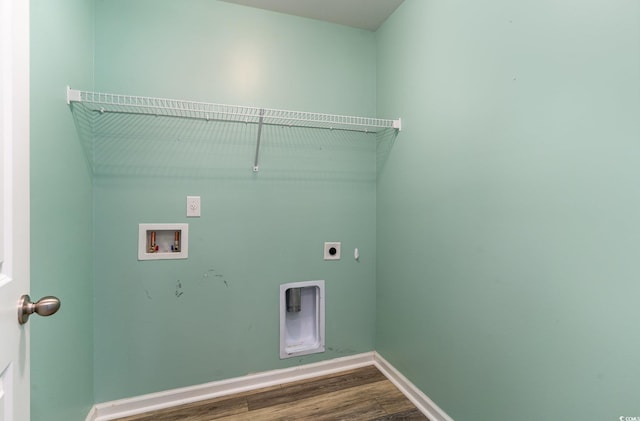 clothes washing area with baseboards, dark wood-style flooring, washer hookup, laundry area, and electric dryer hookup
