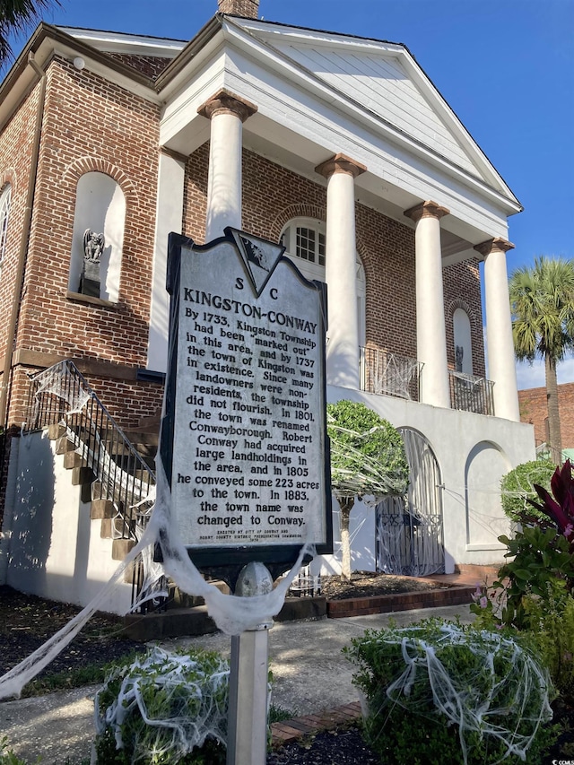 exterior view of brick siding and ornate columns
