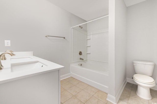 bathroom featuring tile patterned floors, toilet, baseboards, and tub / shower combination