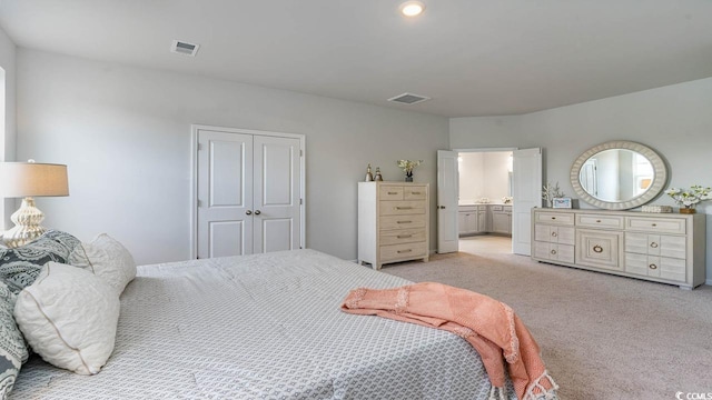 733 Choctaw Dr, Conway, SC 29526 - bedroom featuring light colored carpet, a closet, and ensuite bathroom