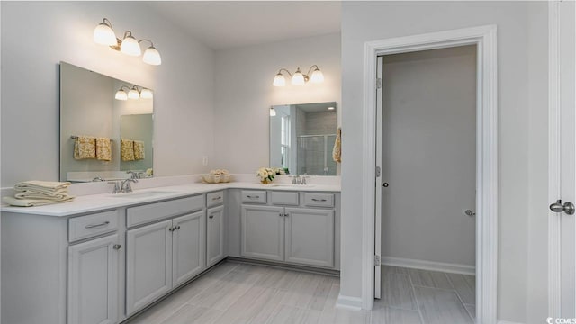 733 Choctaw Dr, Conway, SC 29526 - full bathroom featuring double vanity, a shower stall, and baseboards