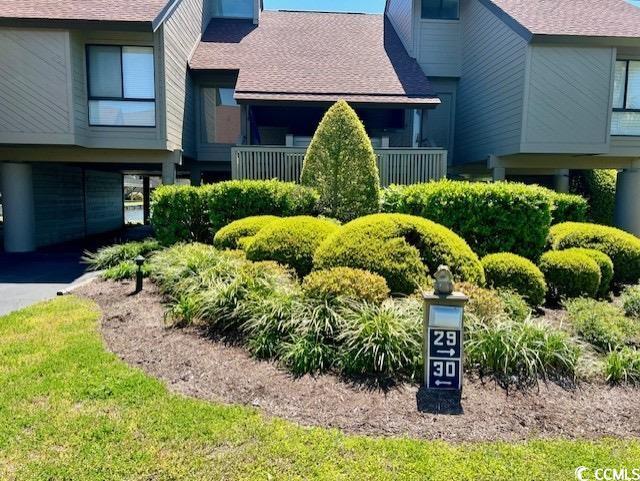 124 Spartina Ct Unit 30, Pawleys Island, SC 29585 - view of front of property with a chimney and roof with shingles