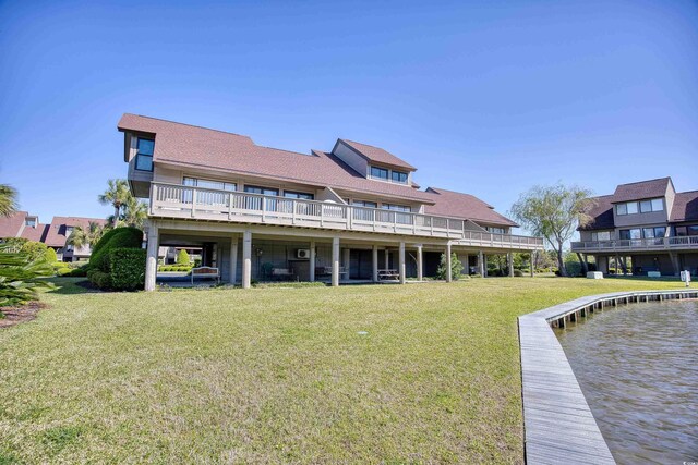 124 Spartina Ct Unit 30, Pawleys Island, SC 29585 - rear view of property with a lawn and a wooden deck