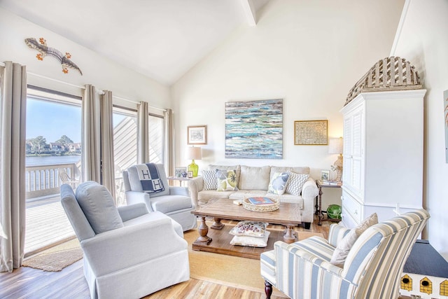 124 Spartina Ct Unit 30, Pawleys Island, SC 29585 - living area with wood finished floors, high vaulted ceiling, beamed ceiling, and a water view