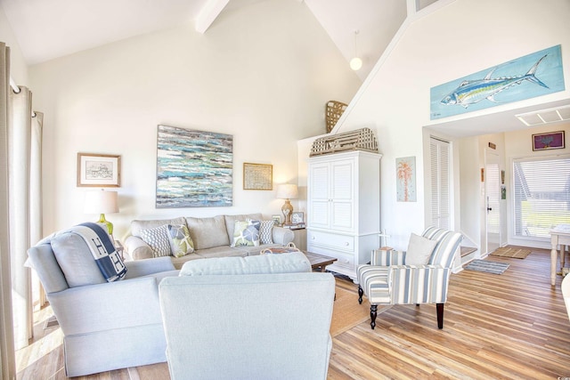 124 Spartina Ct Unit 30, Pawleys Island, SC 29585 - living room with light wood-type flooring and high vaulted ceiling