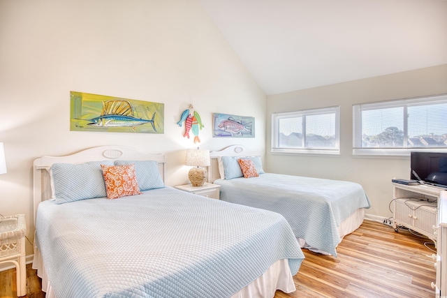 124 Spartina Ct Unit 30, Pawleys Island, SC 29585 - bedroom with wood finished floors and high vaulted ceiling