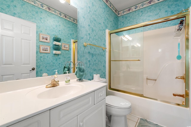4429 Turtle Ln Unit 3A, Little River, SC 29566 - full bath featuring vanity, combined bath / shower with glass door, tile patterned floors, toilet, and wallpapered walls