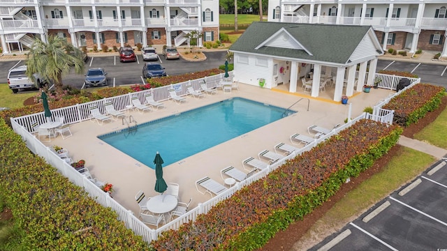4429 Turtle Ln Unit 3A, Little River, SC 29566 - community pool with fence and a patio area