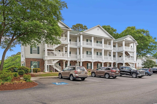 4429 Turtle Ln Unit 3A, Little River, SC 29566 - view of building exterior featuring uncovered parking