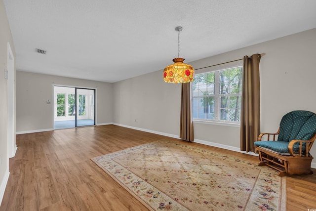 6612 Wintergreen Pt, Myrtle Beach, SC 29588 - interior space featuring visible vents, wood finished floors, and baseboards