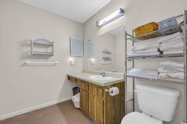 6612 Wintergreen Pt, Myrtle Beach, SC 29588 - bathroom with toilet, baseboards, and vanity