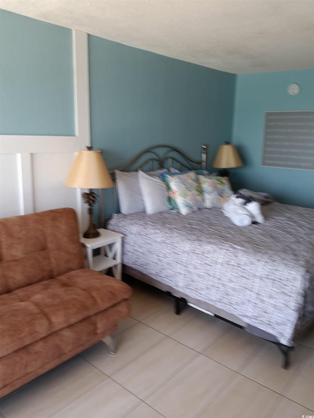 2207 S Ocean Blvd Unit 1407, Myrtle Beach, SC 29577 - bedroom with tile patterned floors