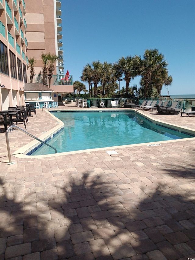 2207 S Ocean Blvd Unit 1407, Myrtle Beach, SC 29577 - community pool with a patio area