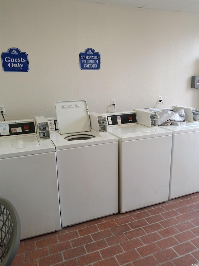2207 S Ocean Blvd Unit 1407, Myrtle Beach, SC 29577 - common laundry area with brick patterned floor and independent washer and dryer