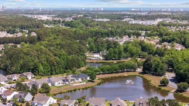 birds eye view of property with a water view and a residential view