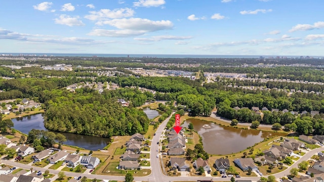 bird's eye view with a water view and a residential view
