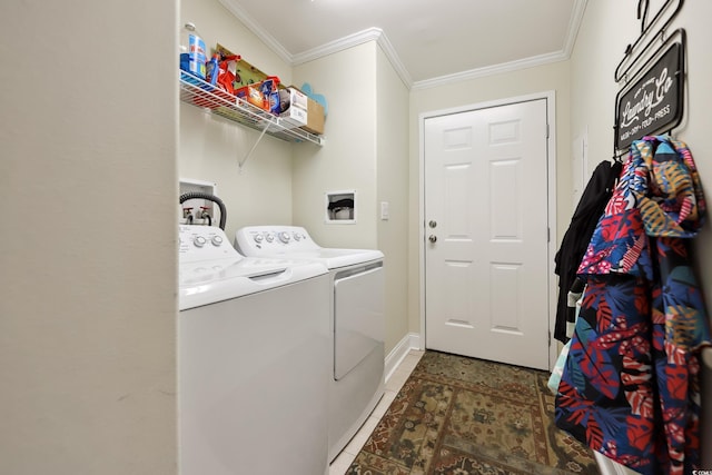 laundry area with washer and clothes dryer, crown molding, and baseboards