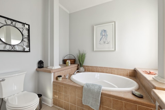 bathroom with a bath, toilet, and crown molding