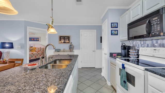 kitchen featuring a sink, crown molding, black microwave, white electric stove, and light tile patterned floors