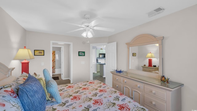 bedroom featuring carpet flooring, baseboards, a ceiling fan, and visible vents