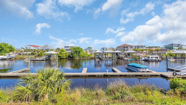 dock area with a water view and a residential view