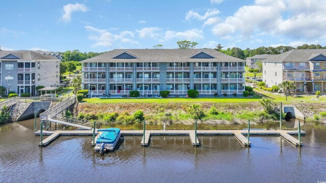dock area with a water view