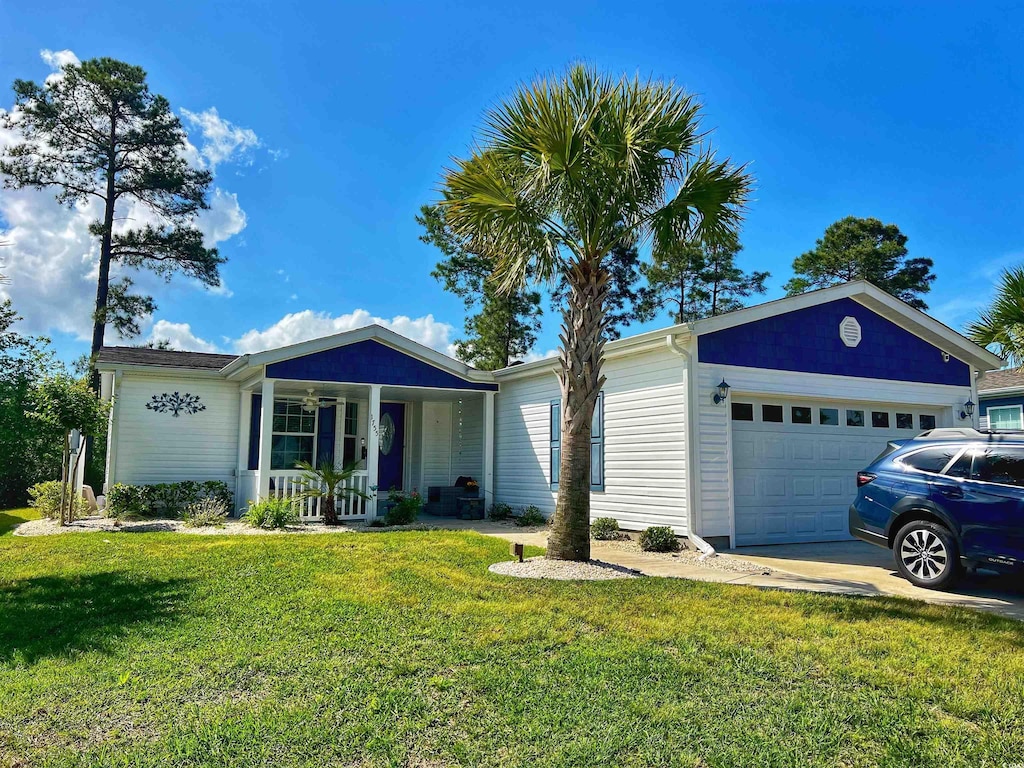 1755 Fairbanks Dr, Conway, SC 29526 - single story home with covered porch, an attached garage, a front yard, and driveway