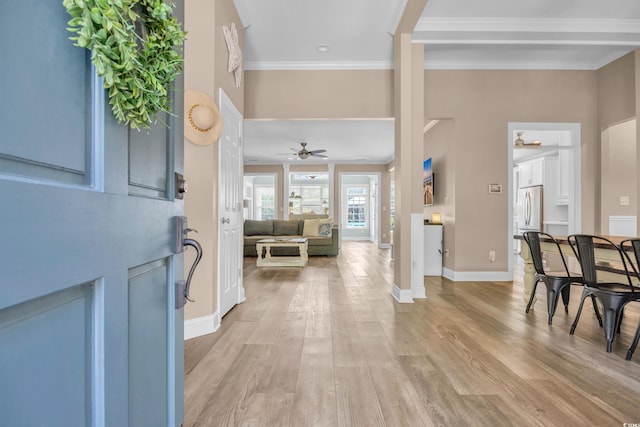 1203 Crooked Oak Dr, Pawleys Island, SC 29585 - entrance foyer featuring crown molding, light wood-style flooring, and a ceiling fan