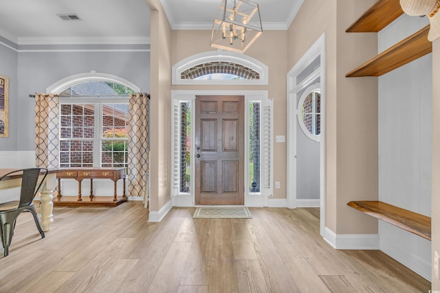 1203 Crooked Oak Dr, Pawleys Island, SC 29585 - entrance foyer featuring baseboards, a notable chandelier, visible vents, and wood finished floors