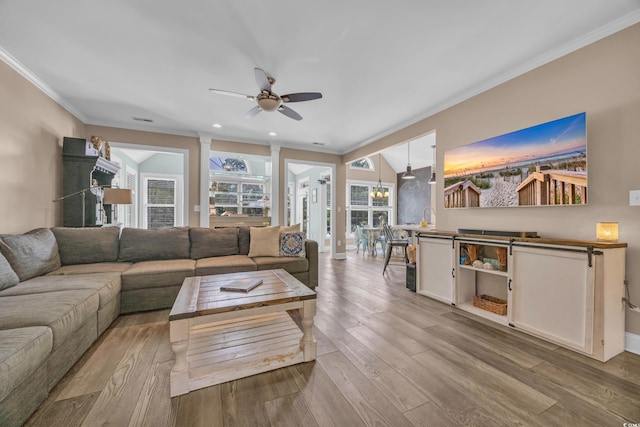 1203 Crooked Oak Dr, Pawleys Island, SC 29585 - living area featuring wood finished floors, baseboards, ceiling fan, ornamental molding, and recessed lighting