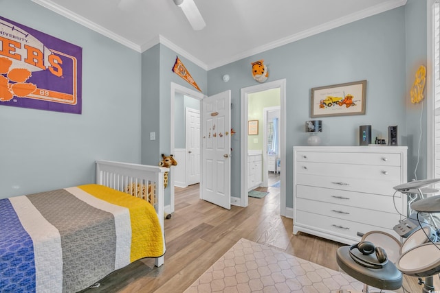 1203 Crooked Oak Dr, Pawleys Island, SC 29585 - bedroom with crown molding, wood finished floors, baseboards, and ceiling fan