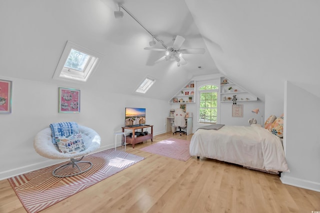 1203 Crooked Oak Dr, Pawleys Island, SC 29585 - bedroom with a ceiling fan, lofted ceiling with skylight, and wood finished floors
