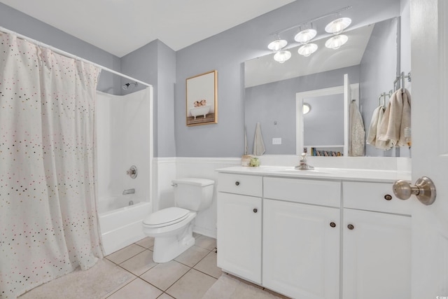 1203 Crooked Oak Dr, Pawleys Island, SC 29585 - full bathroom featuring toilet, wainscoting, shower / bath combination with curtain, tile patterned floors, and vanity