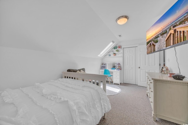 1203 Crooked Oak Dr, Pawleys Island, SC 29585 - bedroom featuring light carpet, a closet, visible vents, and vaulted ceiling with skylight