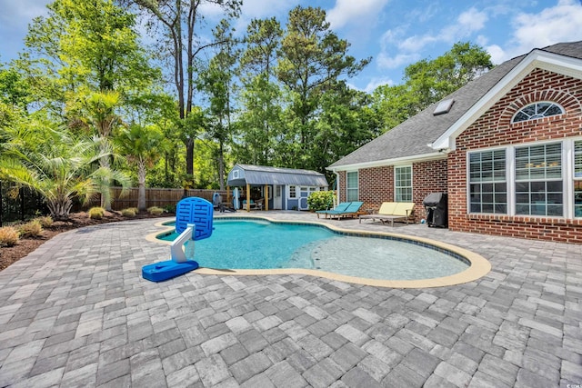 1203 Crooked Oak Dr, Pawleys Island, SC 29585 - view of pool with a patio, an outdoor structure, fence, and a fenced in pool