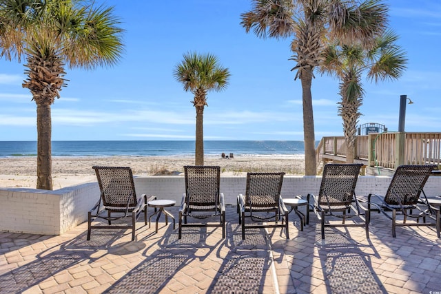 1203 Crooked Oak Dr, Pawleys Island, SC 29585 - view of patio with a water view and a beach view