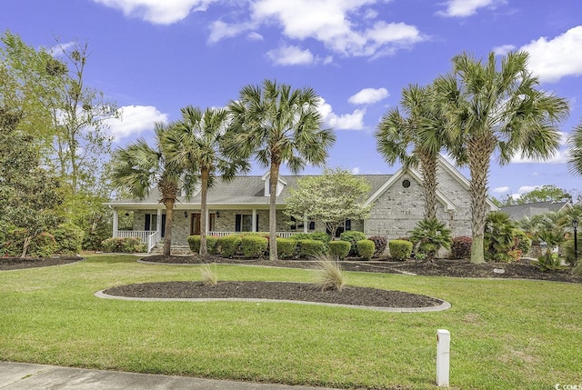 552 Enoree Ct, Myrtle Beach, SC 29588 - single story home featuring a porch, brick siding, and a front yard