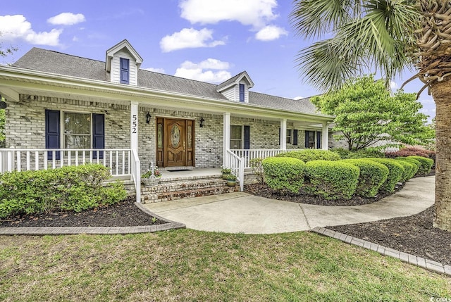 552 Enoree Ct, Myrtle Beach, SC 29588 - view of front of property featuring a porch and brick siding