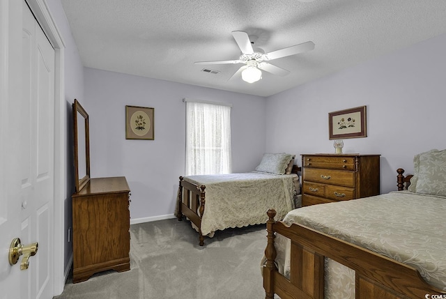 552 Enoree Ct, Myrtle Beach, SC 29588 - carpeted bedroom featuring a ceiling fan, a closet, a textured ceiling, visible vents, and baseboards